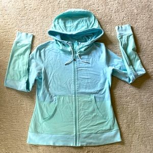Lululemon zip hoodie in great condition. Bi-fabric look with thumb holes
